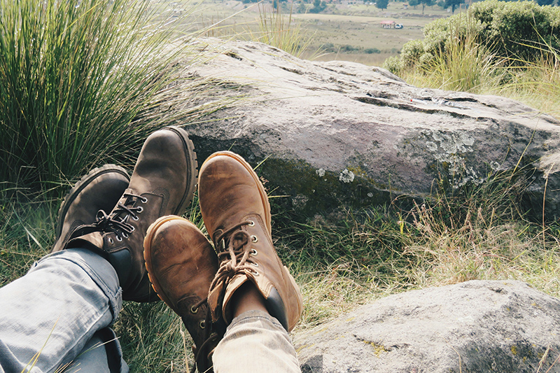 Two pairs of boots in the countryside