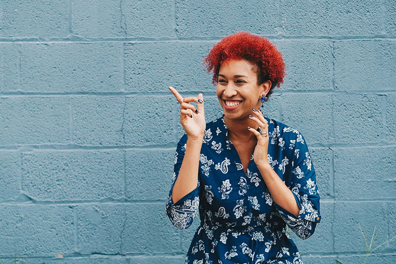 Woman standing and smiling